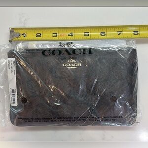 Coach - brand new in packaging.